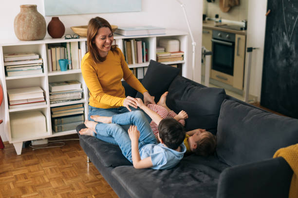 istock mother and kids at home 1318504912