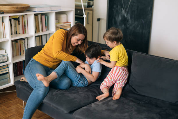 istock mother and kids at home 1318506270