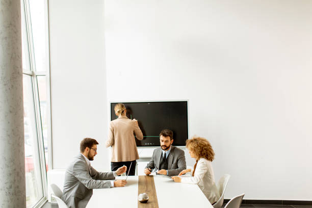 istock Multiethnic young business people working together in the office 1318506396