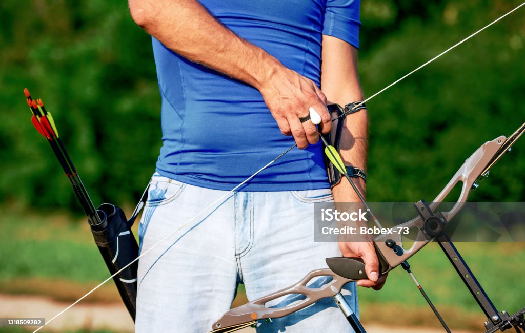 Archer. Sportsman practicing archery. Sport, recreation concept Archery. Archer exercise with the bow. Sport, recreation concept Archery Stock Photo
