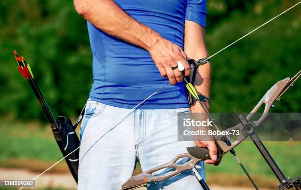 Archer Sportsman Practicing Archery Sport Recreation Concept Stock Photo - Download Image Now