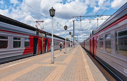 Electric trains at the platform of suburban trains at Yaroslavsky station waiting to board passengers, daily life: Moscow, Russia - May 07, 2021