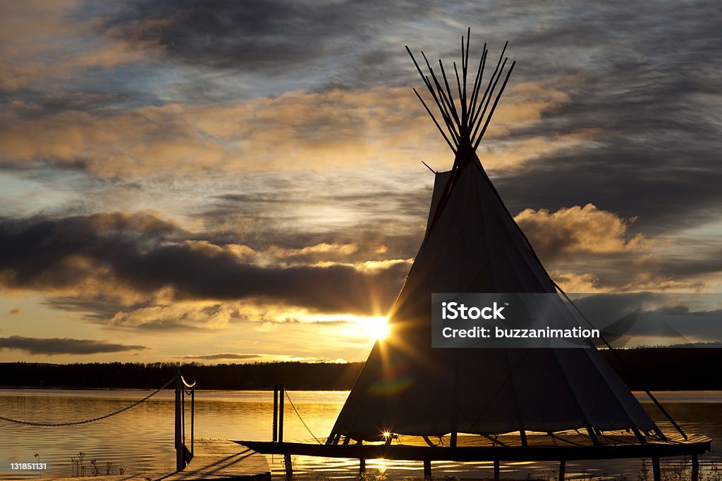 teepee on a sunset Back Lit Stock Photo