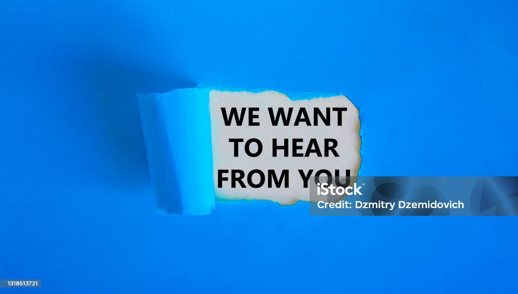 Support symbol. Concept words 'we want to hear from you' appearing behind torn blue paper. Beautiful blue background. Business and support concept. Listening Stock Photo