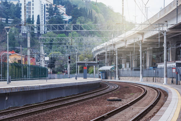 istock Passenger platforms of Khosta station at sunset. 1318516696