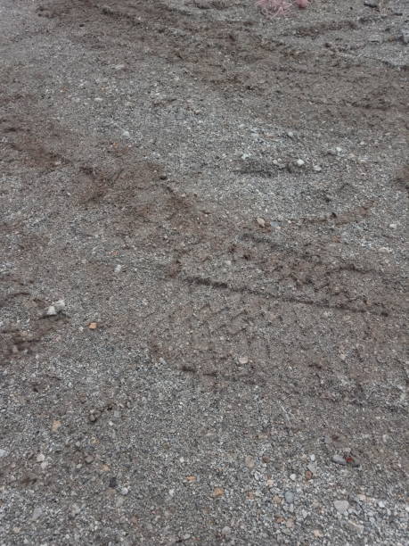 istock unpaved road or dirt road 1318517645
