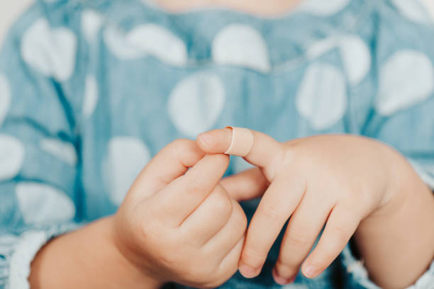 istock Plaster on Childs Finger 1318517660