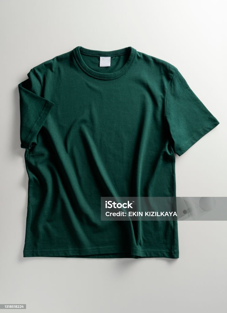 Green t-shirt template, mockup Green t-shirt template, mockup on white background. T-Shirt Stock Photo