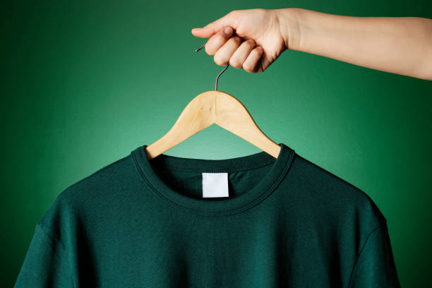 istock T-shirt mockup on wooden hanger 1318519079
