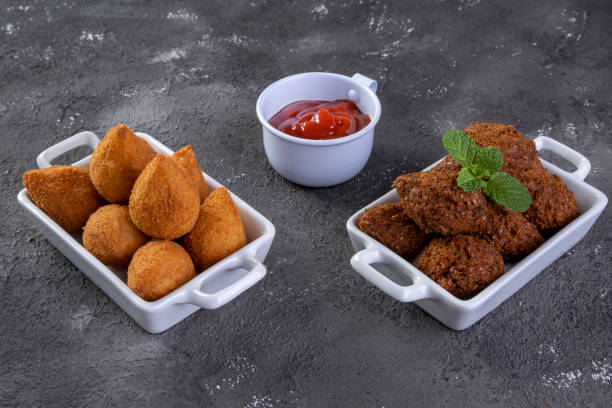 istock Brazilian fried savory snack mix with coxinha and fried kibbeh 1318520374