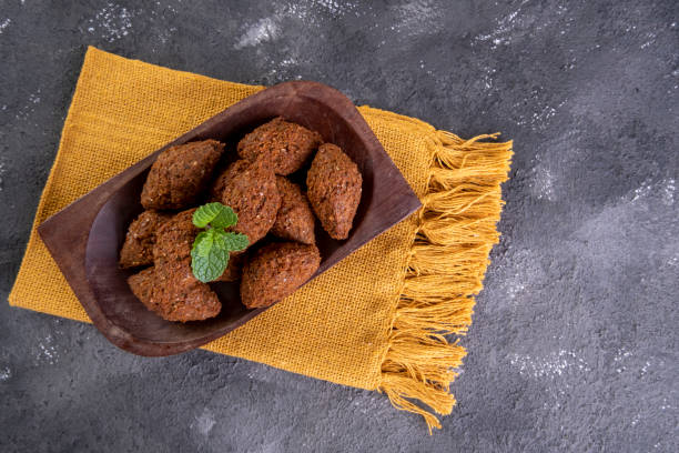 istock Traditional Arabian fried snack made with wheat and stuffed with minced meat. Quibe 1318520410