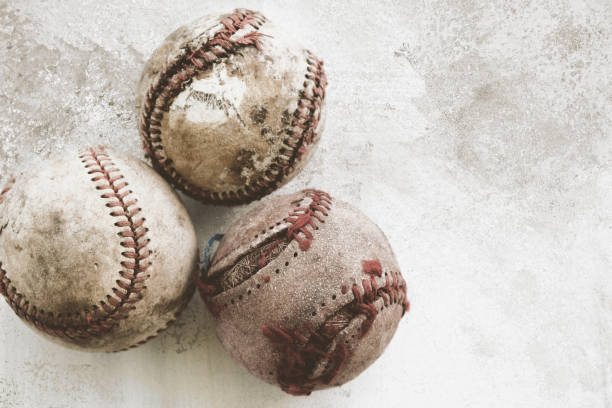 istock Old rugged group of used baseballs 1318529323