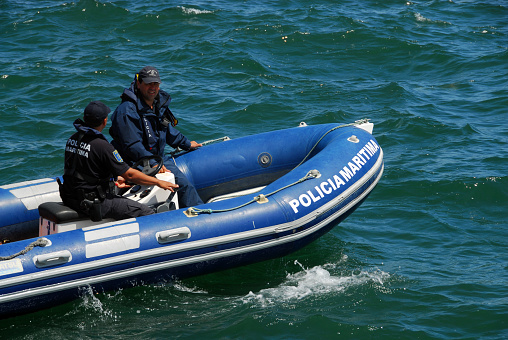 Setúbal, Portugal: maritime police rigid hull inflatable patrol boat on the Sado River estuary.