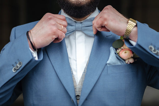 Groom wearing a bow tie close up