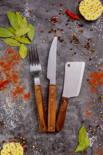 istock Set of kitchenware and spices on dark background. 1318539811