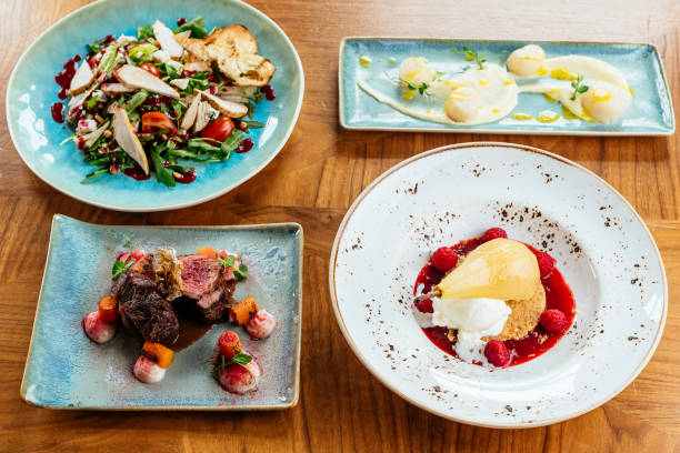 istock meat and vegetables on a plate. menu. top view 1318539834
