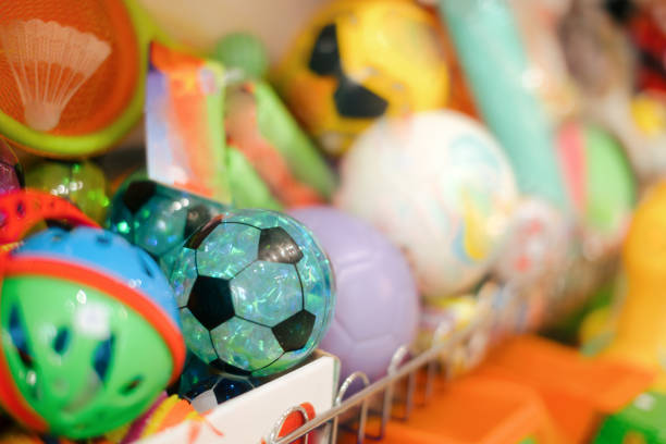 istock Balls Sitting on a Shelf in Toy Store 1318540758