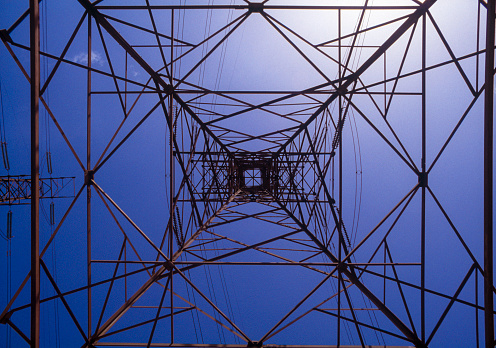 High Voltage Electric Power Grid Poles with Ceramic Insulators at Transformer Substation with Corona discharge