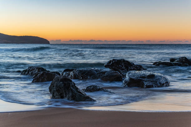 istock Sunrise at the seaside with clear skies 1318547434