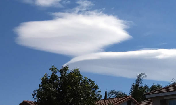 istock Saucer-shaped Clouds in the Sky 1318553894