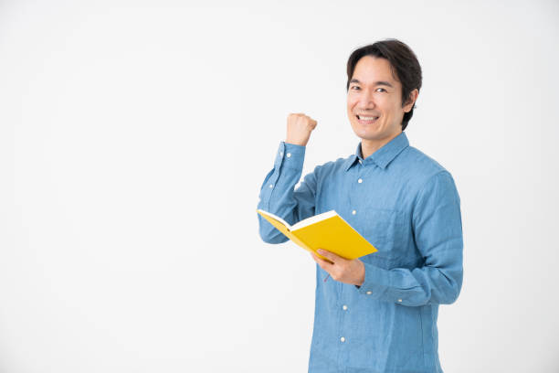 istock middle age man who reads a book 1318555138