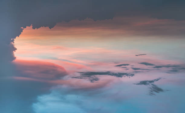 istock Beautiful sunset sky above clouds with dramatic light, Beautiful blazing sunset landscape. 1318555711