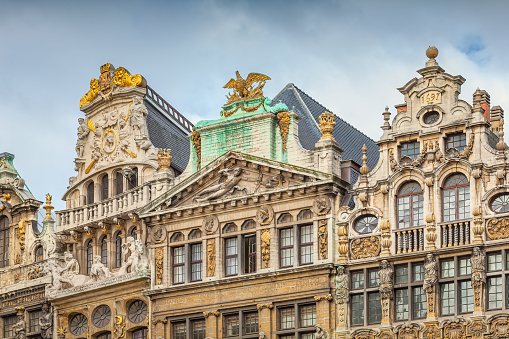 Row of ornate, historic guildhalls on Grand Place in old town Brussels Belgium.