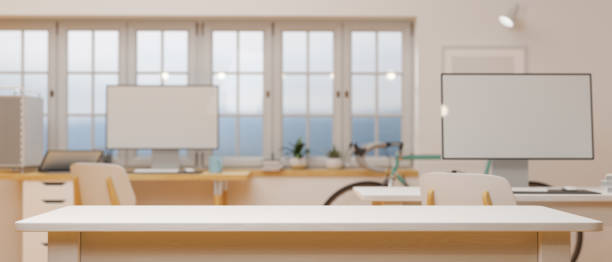 istock Empty white counter in office room with computer and supplies in the background, 3D rendering 1318557133
