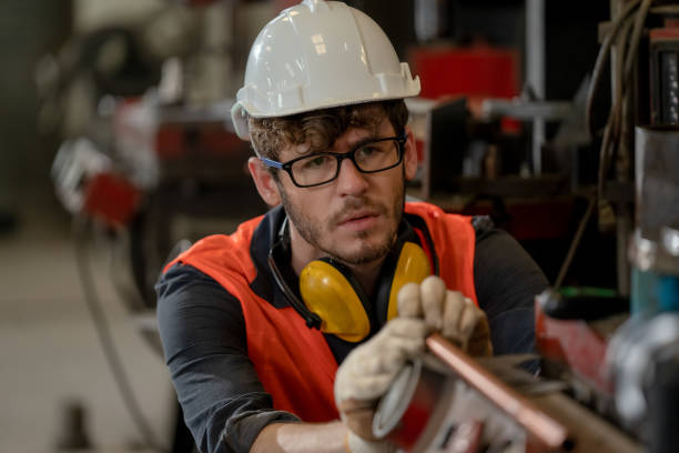 istock Portrait of technician engineer checking process with machinery. 1318562902