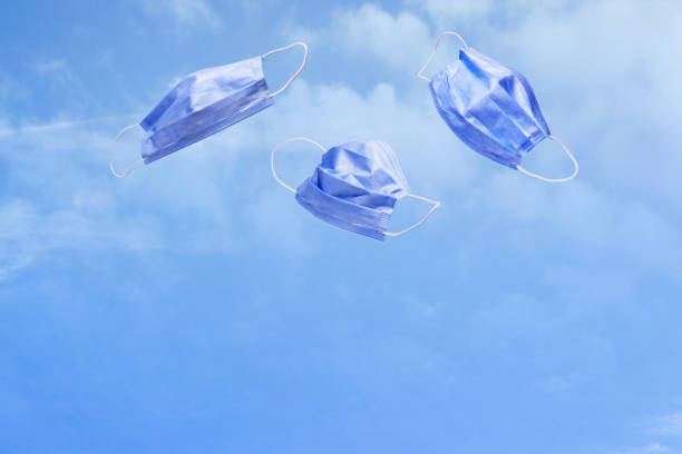 istock Face masks in the air. 1318564701