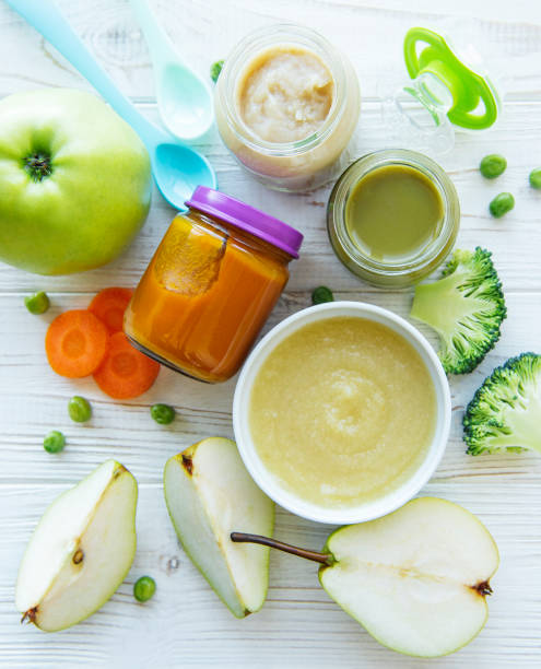 istock Assortment of fruit and vegetable puree 1318567540