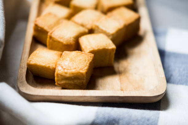 istock Steam fish tofu on wood tray appetizer before a main course. 1318570348