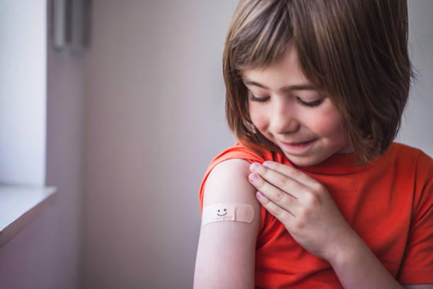 istock Patient Getting Vaccinated against COVID-19. Child vaccination. Coronavirus epidemic. Copy space. 1318575544