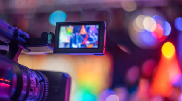 stream at a concert in a hall without spectators stream at a concert in a hall without spectators during a pandemic camera operator stock pictures, royalty-free photos & images