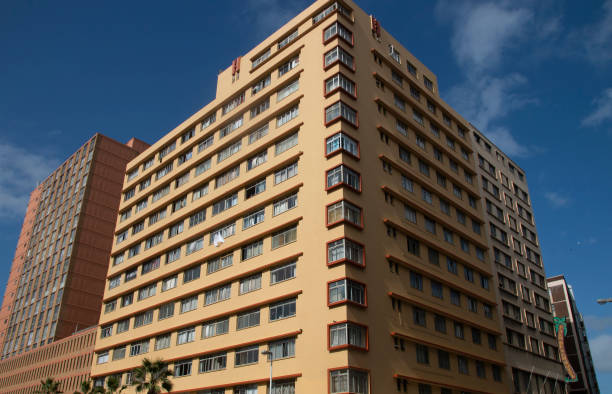 istock Looking Up at High Rise Residential Building 1318578545