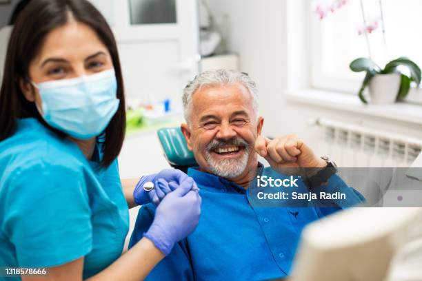 Joking With My Dentist Stock Photo - Download Image Now - Dental Health, Dentist, Dental Equipment