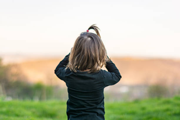 istock Rear view of child in nature 1318582338