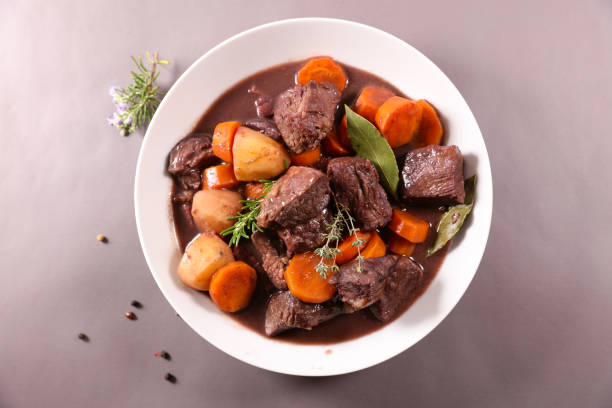 istock beef with wine sauce and vegetables 1318583607
