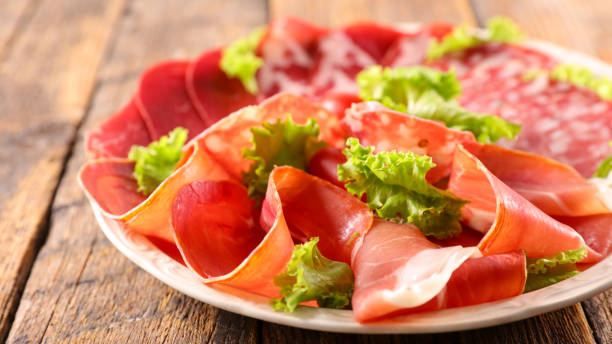 istock plate of various ham and salami 1318583608