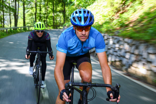 istock Male friends cycling 1318583722