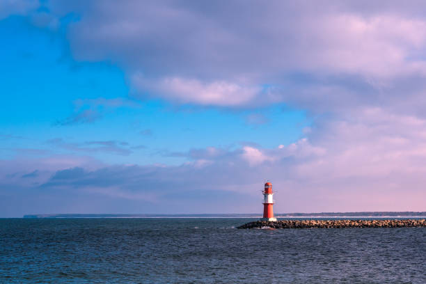 istock Mole on the Baltic Sea coast in Warnemuende, Germany 1318584619