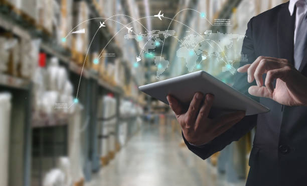 istock Businessman manager using tablet check and control and planning for Modern Trade warehouse logistics,Logistic and transport concept 1318588189