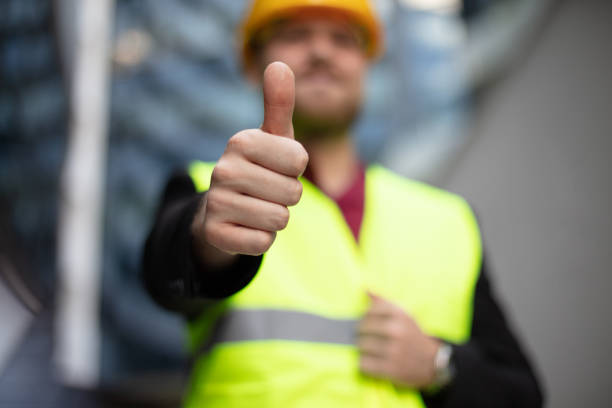 istock Smiling engineer standing on the street.  The job is done. 1318591625