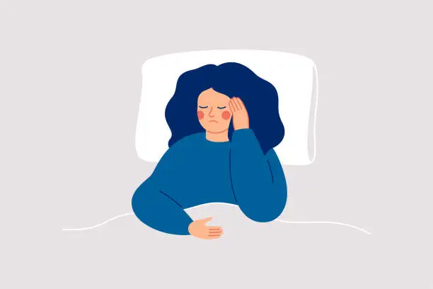 Vector illustration of Girl suffers from insomnia and had difficulty falling asleep.Woman has headaches during sleep time. Sleepy female lying on bed and touching her temple. Insomnia and sleep disorder.