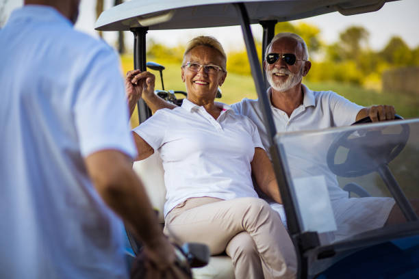 istock Three senior golfer talking.  Seniors going for their weekend play. 1318594495