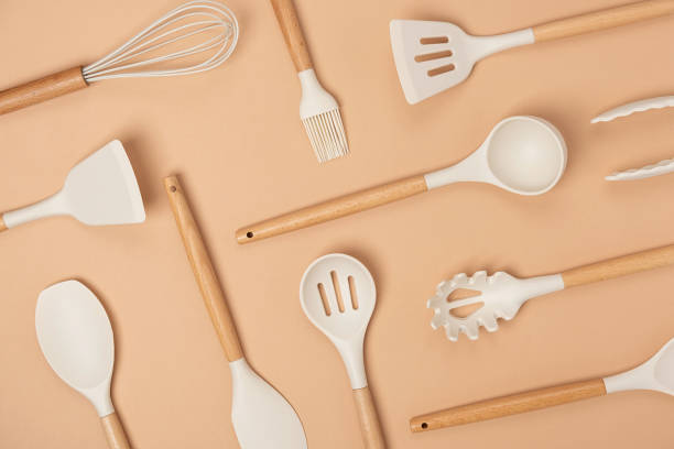 https://media.istockphoto.com/id/1318596743/photo/pattern-made-from-cooking-utensil-set-silicone-kitchen-tools-with-wooden-handle-on-beige.jpg?s=612x612&w=0&k=20&c=3Pl3CYyBqEOvAmn_LyfjOur78Zj0Lsolc8KU_smdgTo=