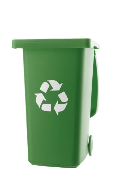 istock Plastic green trash can isolated on white background 1318599393