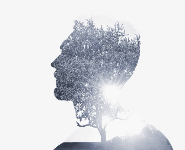 istock Multiple Exposure of young man and crab apple blossoms 1318600605