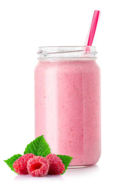 istock raspberry smoothie with straw in jar isolated on white 1318600784