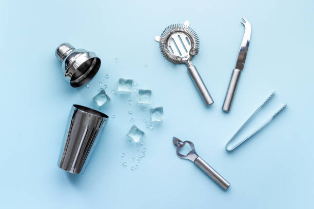 istock Cocktail bar utensils and tools with shaker, strainer and ice 1318601118